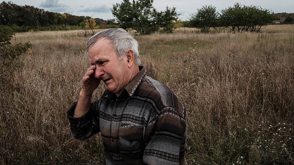 Tears of relief and grief: Photographs from liberated towns in Ukraine