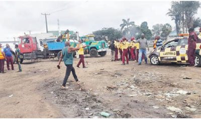 Officials impounding the trucks
