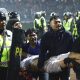At least 174 dead after fans stampede to exit Indonesian football match
