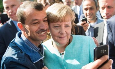 Merkel wins award for Germany's open door policy to refugees