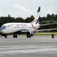 Air Peace Boeing 737 on the apron with maintenance crew around
