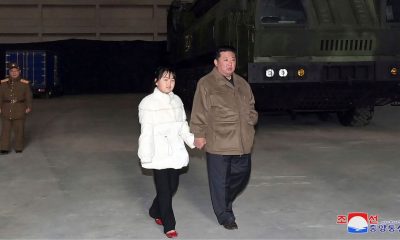 North Korea: Kim Jong-Un reveals 'secret' daughter at missile launch site