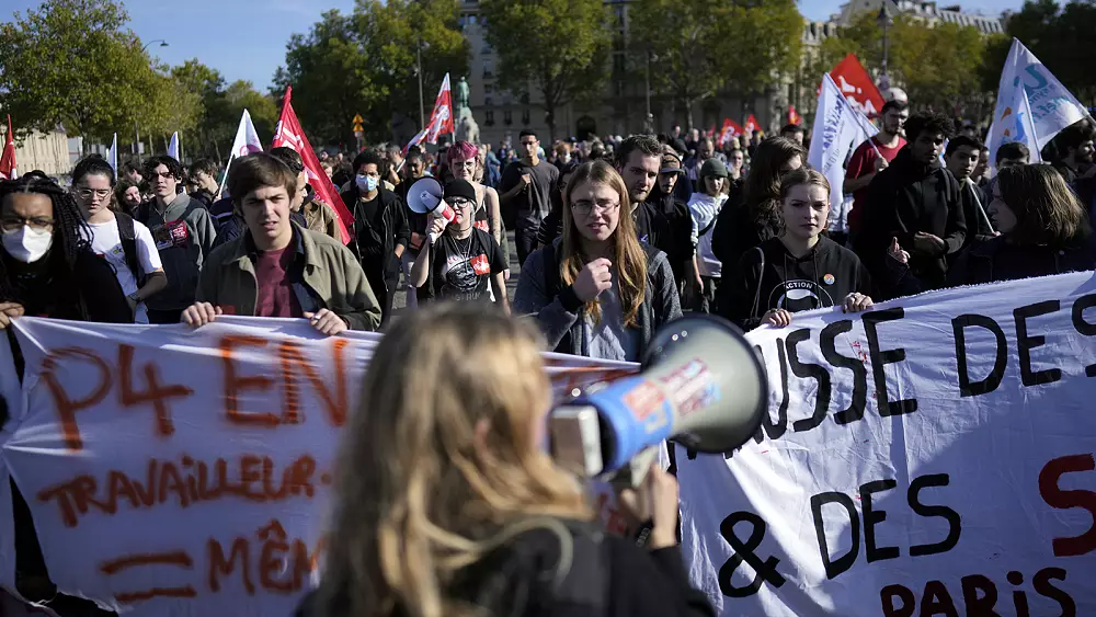 Trade union workers march across France in protest over rising cost of living