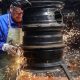 Ukraine war: Lithuanians turn used car parts into stoves to help warm Ukrainians