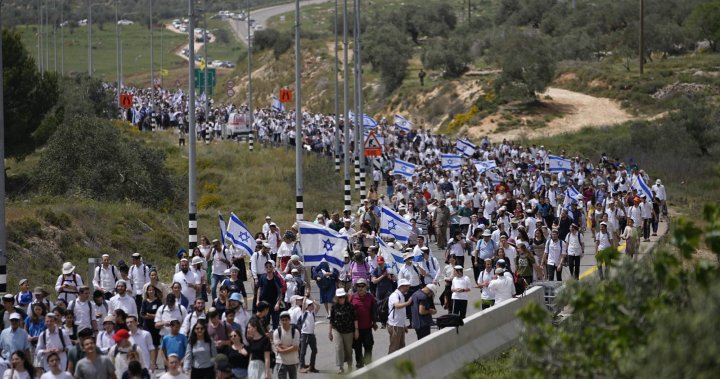 Israeli government figures lead thousands in defiant march on West Bank settlement - National