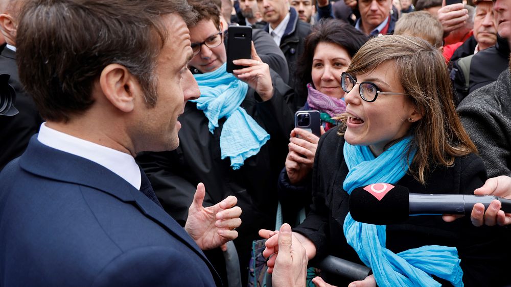 Crowds jeer President Macron during walkabout in Alsace over controversial pension reform