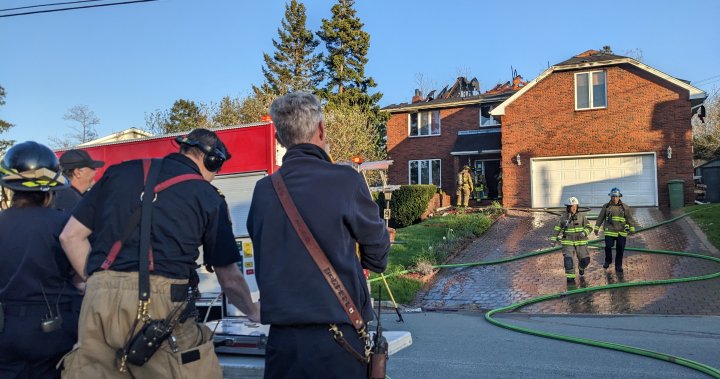 Firefighters pull out of Dartmouth house fire just before roof collapses - Halifax