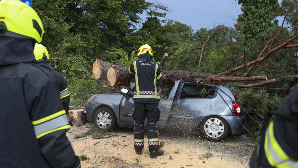 A powerful storm sweeps Balkans region after days of heat, killing at least 5 people