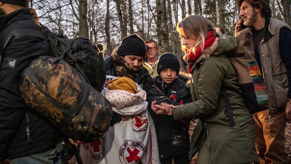 Hundreds of migrants fight for survival on the Polish-Belarusian border waiting to cross into the EU