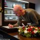 Man United manager Erik ten Hag signed a personal message in memory of Sir Bobby Charlton at the club's training ground