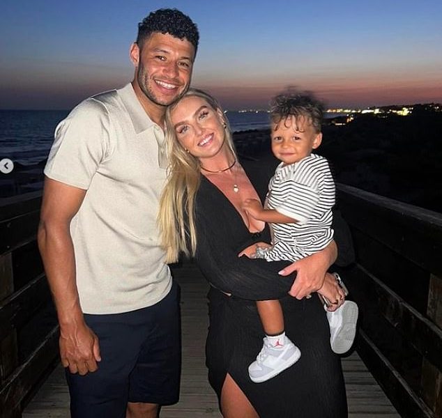 Happy days: Perrie Edwards' fiancé Alex Oxlade-Chamberlain detailed the similarities between themselves and the Beckhams after watching the BECKHAM documentary