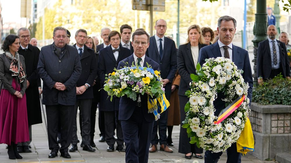 Sweden's PM in Brussels for commemoration, as Islamic State claims football fans deaths