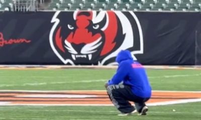 Emotional footage saw Bills' Damar Hamlin spend 15 minutes alone postgame at Bengals' logo
