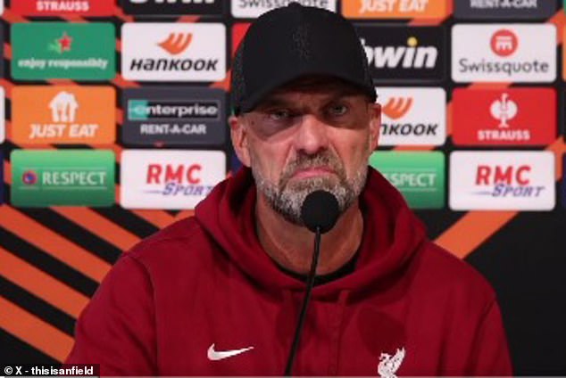Jurgen Klopp fumes as Toulouse fans interrupt his press conference held in a TENT with raucous chanting after 3-2 Europa League win over Liverpool... and asks 'Who had the idea to do the press conference here?'
