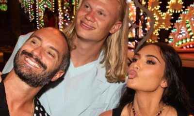 Kim Kardashian (right) admits she 'freaked the f*** out' when she met Erling Haaland (centre)