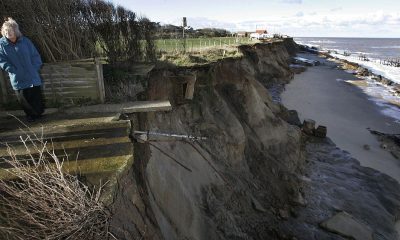'Tearing this nation apart': Coastal erosion tears away homes in eastern England