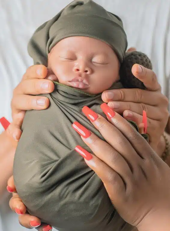 Uche Ogbodo shares face of newborn and unveils his name.webp
