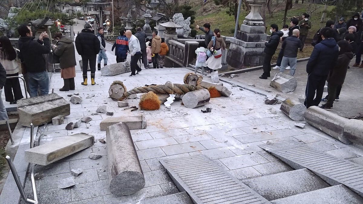 Japan lowers tsunami warning but advises against returning home after earthquakes