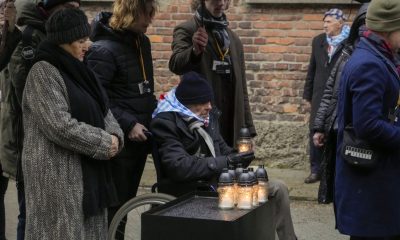 Survivors remember the victims of the Nazi death camps at Auschwitz