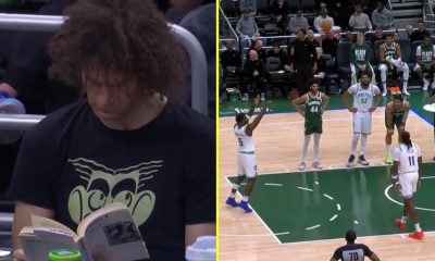 Footage of Robin Lopez reading a book near Bucks' bench during NBA game goes viral after he was traded away to the Kings