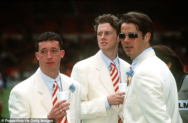Liverpool's Robbie Fowler (left) Steve McManaman (centre) and Jamie Redknapp (right) wearing matching white suits ahead of the 1996 FA Cup final against Manchester United