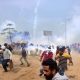 Police fire tear gas from drones at Indian farmers' protest