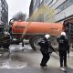 Watch: Angry farmers block streets, dump manure and clash with police in Brussels