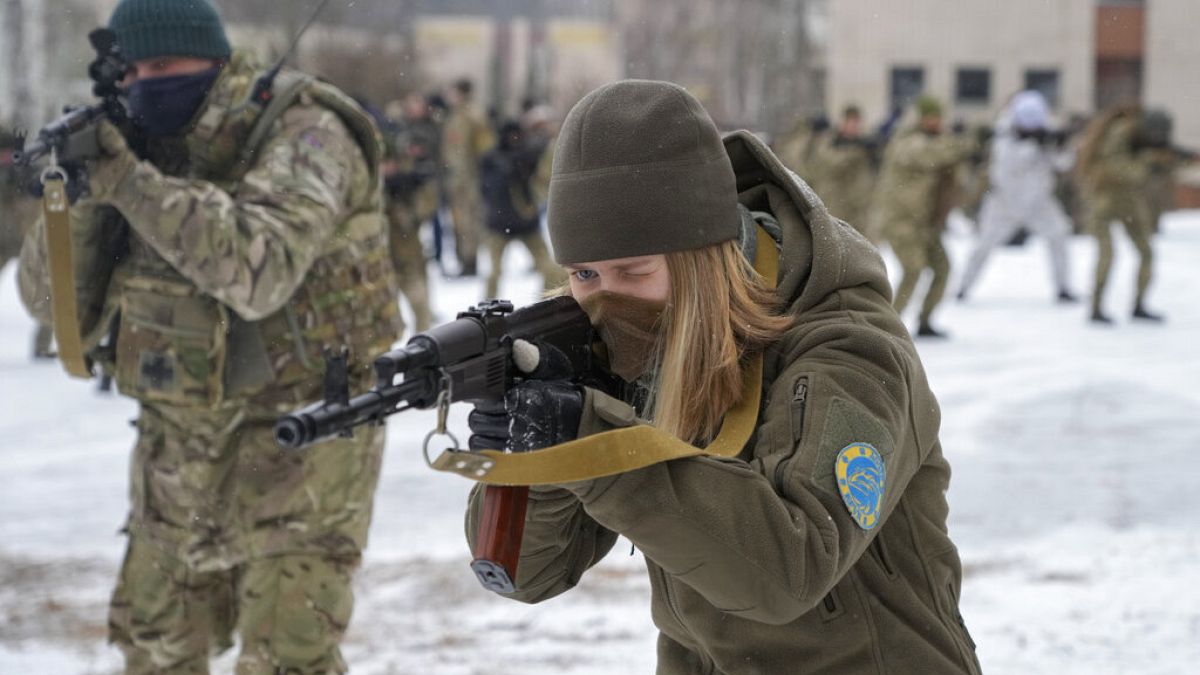 Women in Ukraine prepare for combat in military training sessions