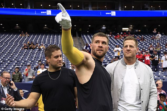Watt's youngest brother, T.J. (center) is a star linebacker for the NFL's Pittsburgh Steelers