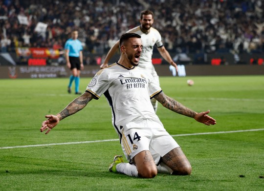 Real Madrid's Joselu celebrates after Atletico Madrid's Stefan Savic scores an own goal and Real Madrid fourth goal