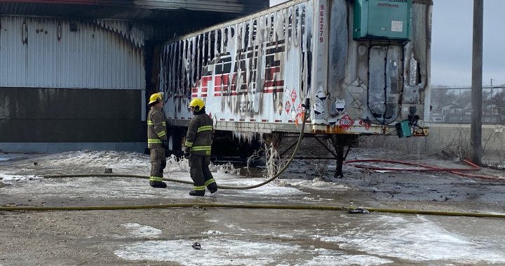 Winnipeg fire crews battle blaze at trucking company, most of building saved - Winnipeg