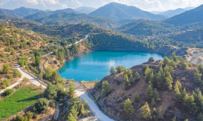 The site of a former copper mine in Xyliatos, Cyprus, restored by creating a lake and reforesting the surrounding environment