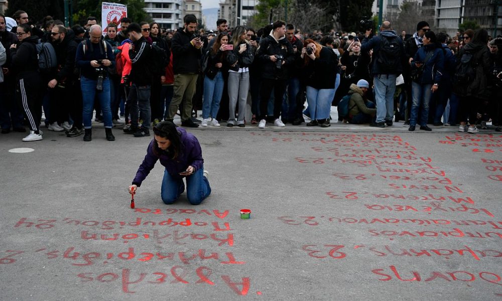 Greeks protest and strike in remembrance of deadliest train crash killed 57