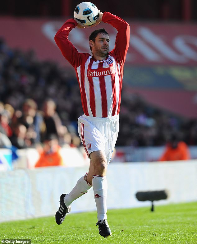 Stoke City's Rory Delap is pictured here leaving the ground as he takes one of his trademark throws against Manchester United in October 2010