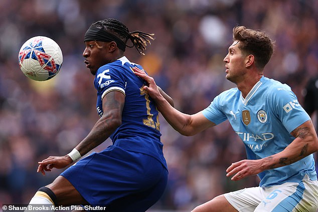 John Stones (right) was not used as a hybrid midfielder at Wembley on Saturday