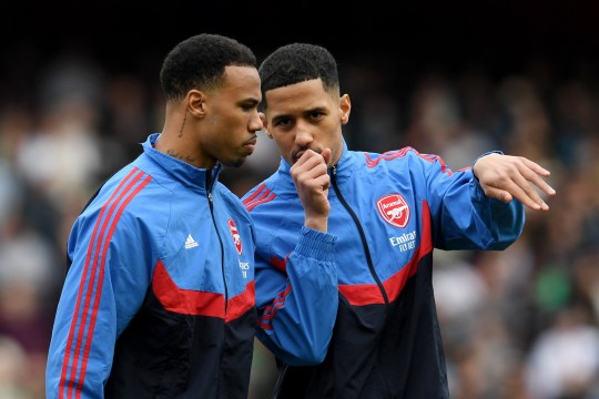 LONDON, ENGLAND - APRIL 14: William Saliba of Arsenal speaks with teammate Gabriel of Arsenal prior to the Premier League match between Arsenal FC and Aston Villa at Emirates Stadium on April 14, 2024 in London, England. (Photo by David Price/Arsenal FC via Getty Images)