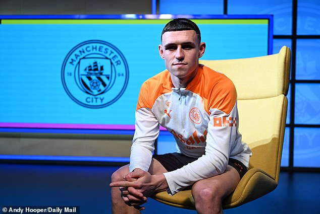 Phil Foden sends warning to rivals Arsenal and Liverpool as Man City star tells Mail Sport he wants to make Premier League history with training ground sign spurring him on