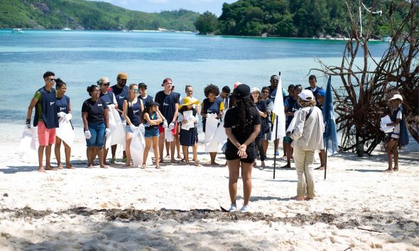 Volunteers help clean up litter from beaches in East Africa’s Seychelles islands