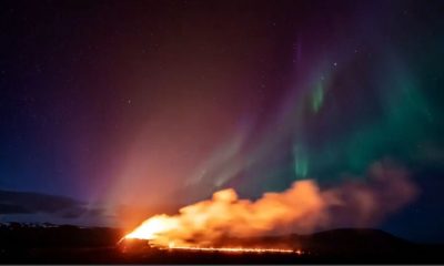 Video. WATCH: Northern Lights shine over an erupting volcano in Iceland