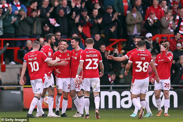 Wrexham secured promotion to League one after a thumping 6-0 win over Forest Green