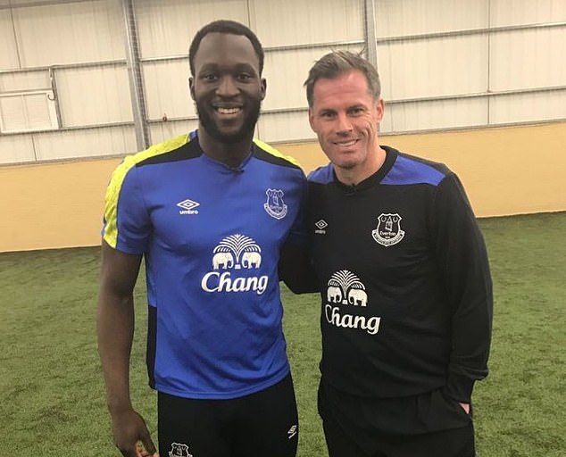 Liverpool legend Jamie Carragher (right) grew up following Everton before joining Liverpool