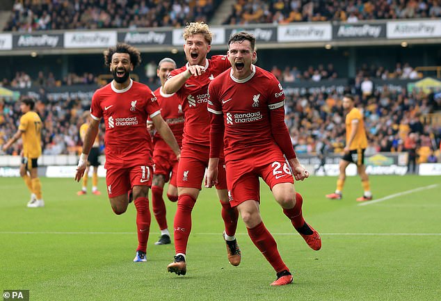 Liverpool star Andy Robertson (middle) admitted his focus is on giving Klopp a perfect farewell