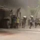 Benue youths caught on camera looting cement truck engulfed by fire