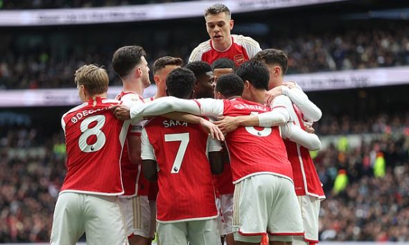 Arsenal beat Tottenham 3-2 on Sunday to maintain their one-point lead at the top of the table